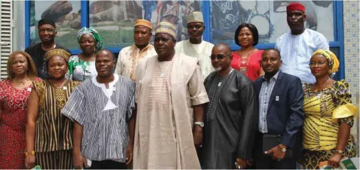  ??  ?? Director-General, National Council for Arts and Culture, Segun Runsewe and other management staff in a group photograph with Burkina Faso Delegation during a courtsey call to NCAC Headquarte­rs in Abuja....recently