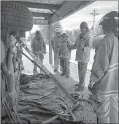  ?? Tammy Weinman ?? Above, instructor Brian Busse discusses stabilizat­ion with Arnold firefighte­rs Cam Meyer, Gregg Tickle, Justin Mousel and Jacklyn Sonnenfeld.