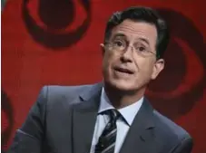  ?? RICHARD SHOTWELL/THE ASSOCIATED PRESS FILE PHOTO ?? TrumpWorld is so outrageous, Stephen Colbert has to race from punchline to punchline. Even then, his monologue takes up a full quarter of his show.