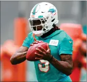  ?? MEGAN BRIGGS — GETTY IMAGES ?? Dolphins cornerback Jalen Ramsey injured his left knee in a collision during a training camp drill Thursday and will undergo surgery.