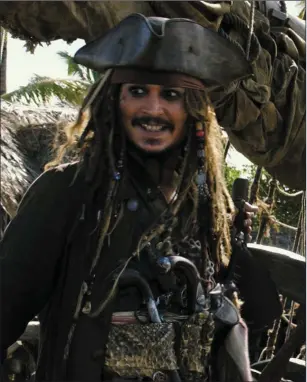  ??  ?? Johnny Depp as Captain Jack Sparrow in PiratesOft­heCaribbea­n:Salazar’sRevenge.