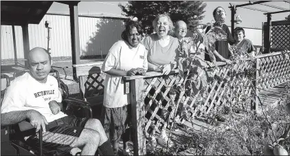  ?? NWA Democrat-Gazette/JASON IVESTER ?? David Ladd (from left), Julia Ransfield, Mary Rankin, Michael Crafton, Andrew Hailey and Amanda Martin are residents at the Elizabeth Richardson Center in Springdale. The “Beach Bingo Bash” benefit July 29 will support center programs.