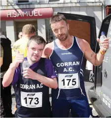  ??  ?? Shane Scully and Alan Stafford at the finish of the 5k road race