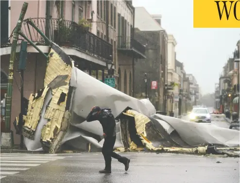  ?? ERIC GAY / THE ASSOCIATED PRESS ?? A section of roof lies in the French Quarter of New Orleans after being blown off by hurricane Ida’s winds. Despite widespread evacuation­s, Louisiana hospitals, many with high numbers of COVID patients, could not be evacuated.