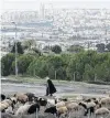  ?? PHOTO: REUTERS ?? A man walks by in Givat Hamatos, an area near East Jerusalem, where Israel intends building more than 1200 homes.