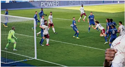  ??  ?? One from the training ground? Luiz makes a smart run and scores
NMC POOL