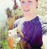  ?? [PHOTO PROVIDED] ?? A Facebook photo shows Justin Terney, 22, a Tecumseh police officer who was shot during an exchange of gunfire that followed a Sunday traffic stop. He died Monday at OU Medical Center.