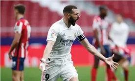  ??  ?? Karim Benzema celebrates his late equaliser at the Wanda Metropolit­ano. Photograph: Helios de la Rubia/Real Madrid/Getty Images