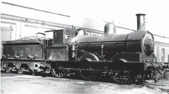  ?? Bernard Matthews Collection ?? Shortly after reallocati­on from Shildon in April 1925, McDonnell ‘J22’ (NER ’59’) class 0-6-0 No 502 is at rest on the spur between the north roundhouse and the outside turntable at London Road shed. Its main employment at Carlisle was banking and trip work, which it undertook until condemned on the last day of February 1929, to be cut up at Darlington, its place of birth. McDonnell brought 44 of the mixed traffic ‘59s’ into service between September 1883 and March 1885. Although an NER design, it is interestin­g to note the timing of the transfer to Carlisle – arrival of a trio of ‘J22s’ just pre-dated the ‘move’ to Southern Scottish management. Note the Westinghou­se pump on what was originally the fireman’s side (most were converted to right-hand drive). The tender is of Great Southern & Western Railway type (McDonnell’s previous employer at Inchicore in Ireland) with the outside frames cut-away between horn guides. The cab roof extension is to protect the crew when running tender-first, 50 per cent of the time during banking work, but not fitted at this time is the related tender weatherboa­rd – a vertical sheet at the front of the tender that helped to ‘enclose’ the cab. Similar to the front cab sheet it had two spectacle holes to aid sighting, albeit these were round rather than rectangula­r, so created something of a mismatch.