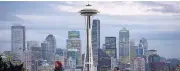  ?? MIKE KANE / BLOOMBERG ?? All of Seattle’s 241,450 condos and houses had a market value of US$111.5 billion, the website Redfin calculated in 2014.