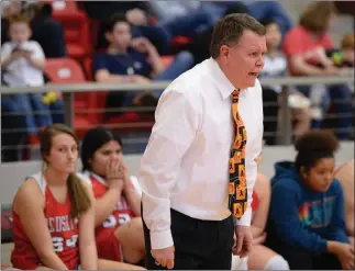  ?? FILE PHOTO ?? Pocahontas head coach Harlan Davis directs his team against Farmington during the first half of the Cardinals’ 65-48 win in the Class 4A State Girls Basketball Tournament on March 5, 2020. Davis earned his 700th career win for high school girls varsity basketball on Feb. 23.