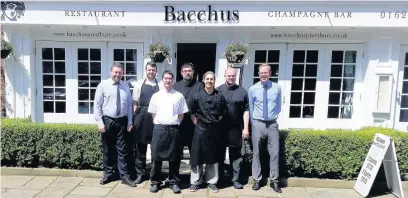  ??  ?? ●● Prestbury’s Bacchus owner Jon Rebecchi, far left, with (from left) staff Dave Cooper, Stephen Barratt, Alan Roach, Luis Capo Galeote, Ric Ashworth and Mike Williams