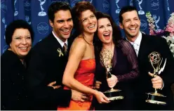  ?? File/associated Press ?? Shelley Morrison (left), Eric Mccormack, Debra Messing, Megan Mullally and Sean Hayes celebrate their awards for their work in ‘Will & Grace’ at the 52nd annual Primetime Emmy Awards in Los Angeles.