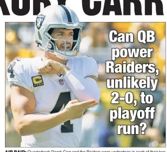  ?? Getty Images ?? AIR RAID: Quarterbac­k Derek Carr and the Raiders were underdogs in each of their two victories, the only 2-0 team to overcome the odds in each game.