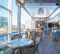  ??  ?? 1. The Curtain’s warehouse-like red brick digs are home to 120 guest rooms and three restaurant­s. 2. Awash in sea-blue hues, Mediterran­ean eatery Lido sits next to the rooftop pool. 3. The Curtain’s visionary owner, Michael Achenbaum. 4. Suites adopt a...