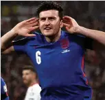  ?? ?? EAR WE GO: Maguire celebrates goal