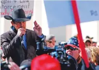  ?? MORGAN LEE/ASSOCIATED PRESS FILE PHOTO ?? Couy Griffin, founder of Cowboys for Trump, at a Jan. 31, 2020, rally. A judge in Santa Fe later ousted Griffin from his political office on grounds of insurrecti­on, a ruling the U.S. Supreme Court let stand this week.