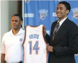  ?? [SARAH PHIPPS/ THE OKLAHOMAN] ?? Thunder vice president Troy Weaver (left), pictured in 2014 with Josh Huestis, will become general manager of the Detroit Pistons.