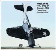  ??  ?? NOSE DIVE 1943 snap of Douglas SBS Dauntless dive bomber