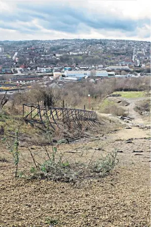  ??  ?? Gone downhill: How the skiing centre looks now after being wrecked by fire