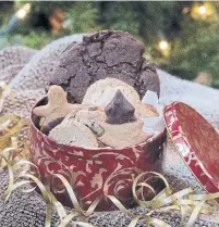  ?? HILLARY LEVIN TRIBUNE NEWS SERVICE FILE PHOTO ?? While it may seem that scooping dough from your dinner spoon is easy, it comes with a host of issues, from uneven cookie sizes to messy fingers. So do like the pros and buy a cookie scoop.