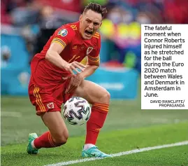  ?? DAVID RAWCLIFFE/ PROPAGANDA ?? The fateful moment when Connor Roberts injured himself as he stretched for the ball during the Euro 2020 match between Wales and Denmark in Amsterdam in June.