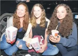  ?? Picture: Chris Davey FM3988212 ?? Donna Golding, Annie Golding, 16, and Ellie Crew, 16, enjoying the film