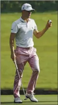  ?? MARK HUMPHREY — THE ASSOCIATED PRESS ?? Justin Thomas waves Sunday on the 18th hole during the final round of the World Golf Championsh­ip-FedEx St. Jude Invitation­al in Memphis, Tenn.