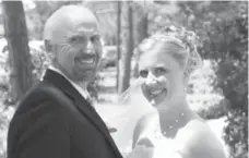  ?? COURTESY ERINN DAVIS ?? Bruce Tushingham with his daughter Erinn Davis on her wedding day. Tushingham was struck dead by a car while cycling in 2013.