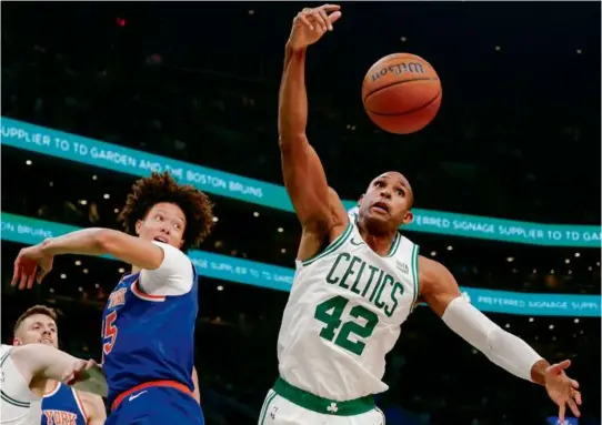  ?? MATTHEW J. LEE/GLOBE STAFF ?? Al Horford came off the bench Tuesday and displayed the energy and effort of a rookie just trying to make the final roster.