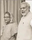  ?? HT PHOTO ?? Prime Minister Narendra Modi with Bangladesh PM Sheikh Hasina