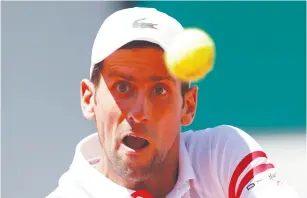  ??  ?? SERBIA’S NOVAK Djokovic in action yesterday during the final against Greece’s Stefanos Tsitsipas. (Gonzalo Fuentes/Reuters)