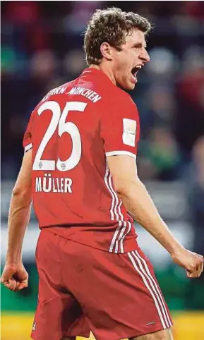  ?? EPA PIC ?? An ecstatic Thomas Mueller celebrates after scoring for Bayern Munich against Borussia Moenchengl­adbach on Sunday.