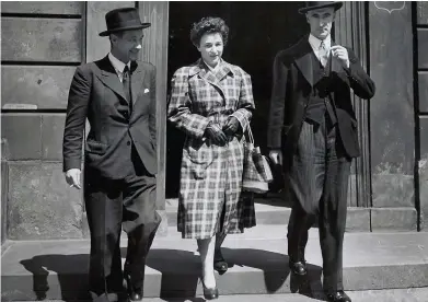  ??  ?? The Duke of York hands over the Royal Warrant for the safekeepin­g of the Stone of Destiny in the Great hall of Edinburgh Castle. Left: Kay Matheson in 1951