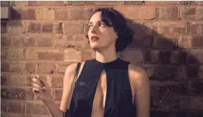  ?? STEVE SCHOFIELD/AMAZON ?? Phoebe Waller-Bridge takes a smoke break as the title character in Amazon’s Emmy-winning “Fleabag.”