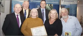  ??  ?? Mollie Kehoe, Mary Furlong and Tom Furlong from The Villas Residents Associatio­n, Clonroche with the Keep Wexford Beautiful award.