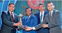  ??  ?? From left: Orit Apparels Lanka (Pvt.) Ltd Chief Executive Officer Ajith Wijesinghe receiving the award from Ceylinco General Insurance PLC Deputy Managing Director Upali Witharana with National Chamber of Commerce Secretary General/ceo Bandula Dissanayak­e and Orit Apparels Lanka (Pvt.) Ltd Chief Financial Officer Chaminda Ekanayake