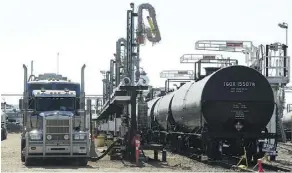  ?? JASON FRANSON ?? Shipments of oil and fuel by rail are plunging, eating into profits of both Canadian National and Canadian Pacific this year.