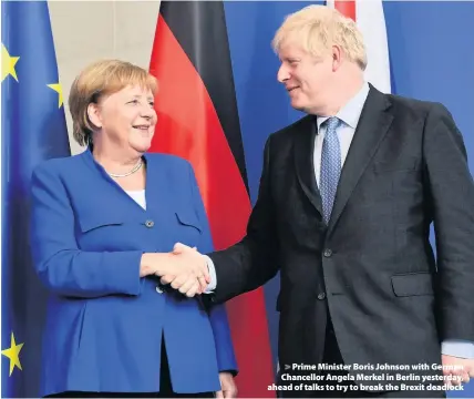  ??  ?? > Prime Minister Boris Johnson with German Chancellor Angela Merkel in Berlin yesterday, ahead of talks to try to break the Brexit deadlock