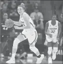  ?? JESSICA HILL/AP ?? Connecticu­t’s Katie Lou Samuelson controls the ball during the first half of an exhibition game Sunday in Storrs.