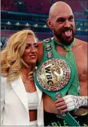  ?? ?? Saturday night special: Tyson Fury with his wife, Paris, after his victory