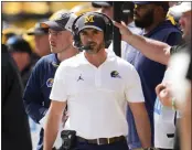  ?? PAUL SANCYA – THE ASSOCIATED PRESS FILE 2023 ?? Jesse Minter is the Chargers’ new defensive coordinato­r after serving the same post at Michigan the past two seasons.