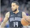  ?? JOHN RAOUX/ASSOCIATED PRESS ?? The Magic’s D.J. Augustin is one of the NBA’s top 3-point shooters at point guard this season.