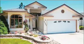  ??  ?? The average selling price of a single-family home in Kelowna is at a record-high $716,500. This Dilworth Mountain home is listed for sale for $722,000.