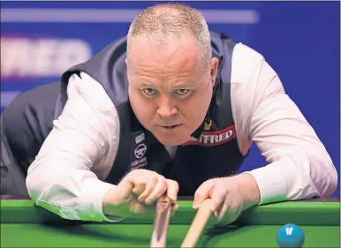  ?? ?? John Higgins at the World Championsh­ips in April before he started his weigh-loss regime