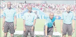  ?? ?? The match officials, led by Thokozane Dlamini (2nd L), should be commended for their fair and impartial officiatin­g during the Mbabane derby. Their even-handed approach ensured that supporters had no reason to dispute the refereeing decisions, resulting in a more enjoyable and sportsmanl­ike atmosphere at the match.