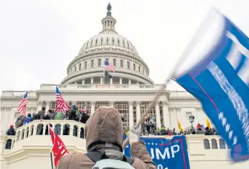  ?? NYT ?? Supporters of then-President Donald Trump storm the US Capitol in Washington on Jan 6 last year.