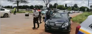  ?? ?? A police roadblock along the Harare-Bulawayo Highway