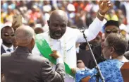  ?? Issouf Sanogo / AFP / Getty Images ?? George Weah attends his presidenti­al swearing-in ceremony at a sports stadium in Monrovia, Liberia.