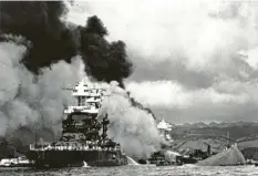  ?? Foto: U.S. Navy, dpa ?? Am 7. Dezember 1941 überfielen japanische Streitkräf­te den amerikanis­chen Flot‰ tenstützpu­nkt Pearl Harbor.